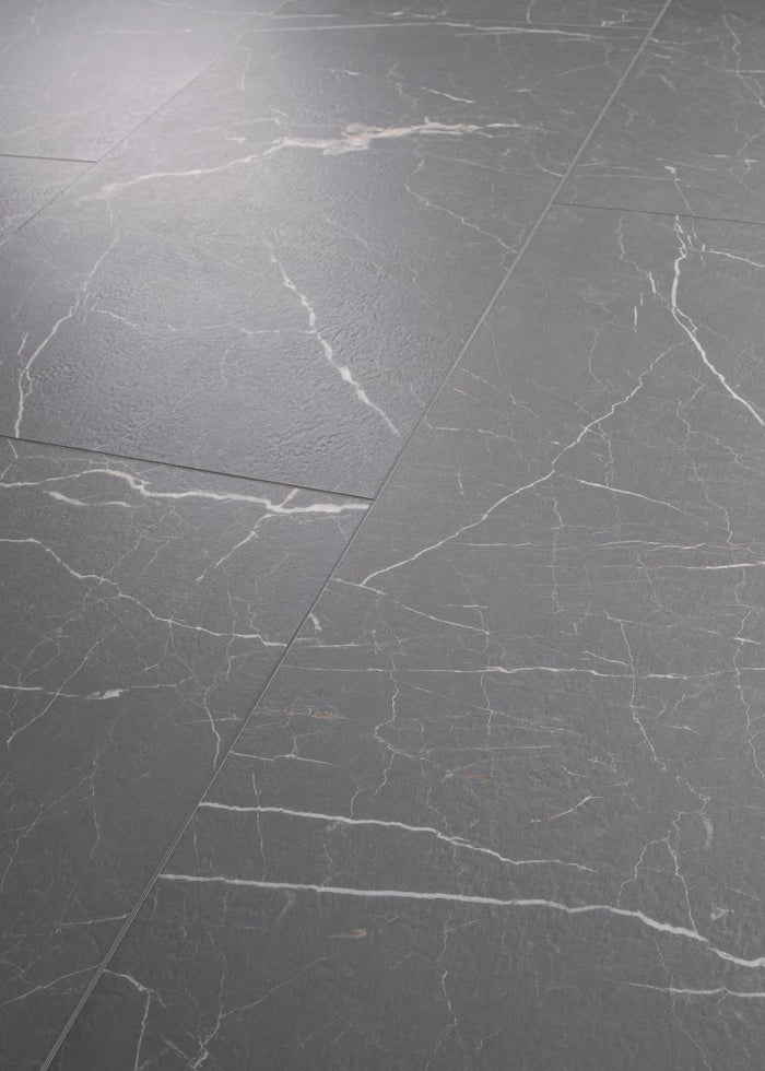 COREtec CRT01 Natural Opula Bronzeite Marble waterproof luxury vinyl tile close-up rich warm bronze marble veining 18x36