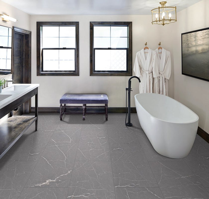 COREtec Natural Opula Bronzeite Marble installed in luxury primary bathroom with warm bronze marble aesthetic